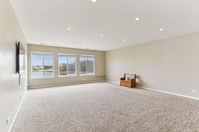 330 Alexis St, Plano, IL 60545 - carpeted empty room with recessed lighting and baseboards
