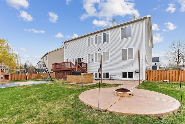 330 Alexis St, Plano, IL 60545 - rear view of house featuring a patio area, a fenced backyard, a fire pit, and a lawn