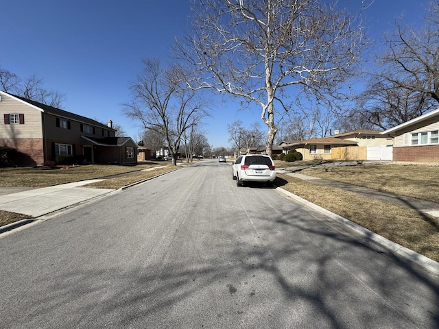 view of street with curbs and sidewalks