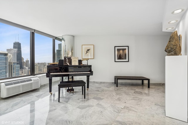 interior space featuring a city view, marble finish floor, and a wall unit AC