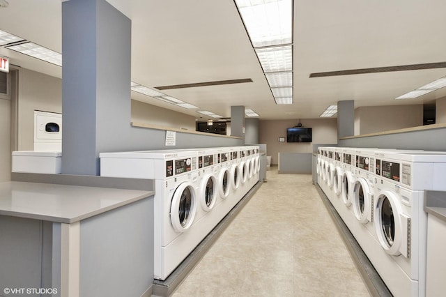 common laundry area with washing machine and dryer