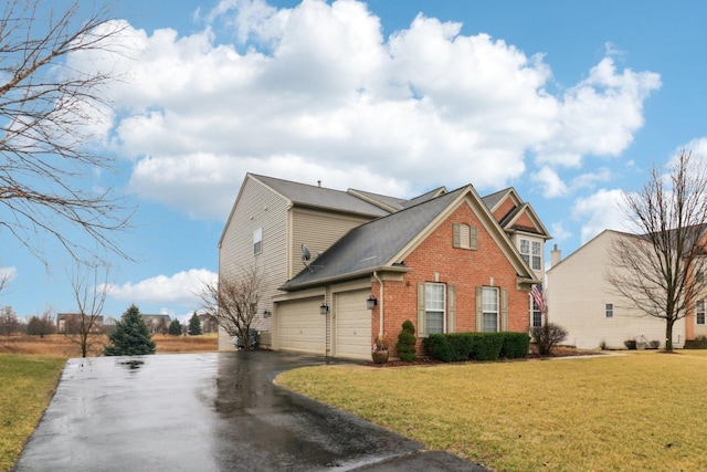 2734 Carrington Dr, West Dundee, IL 60118 - view of property exterior featuring driveway, brick siding, a lawn, and a garage