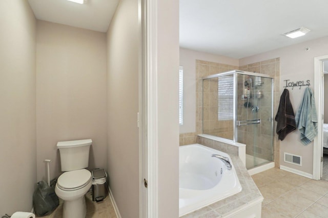 2734 Carrington Dr, West Dundee, IL 60118 - full bathroom with a garden tub, a shower stall, toilet, tile patterned floors, and baseboards