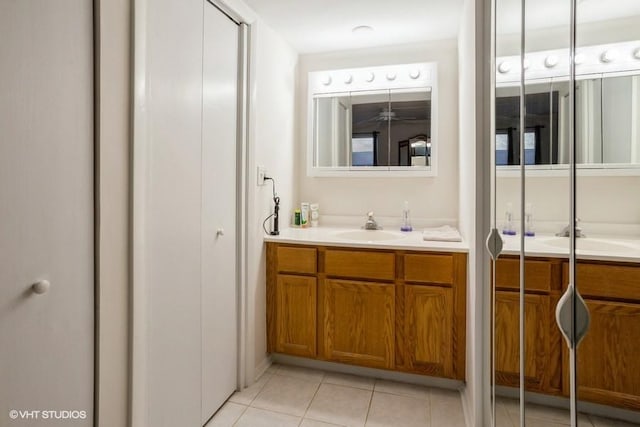 bathroom with vanity and tile patterned flooring