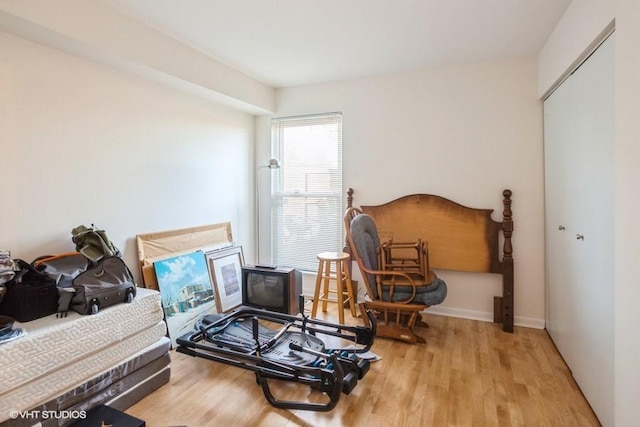 bedroom with wood finished floors