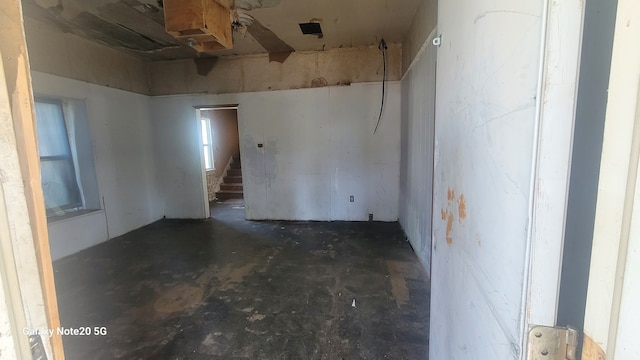 809 W Columbia St, Danville, IL 61832 - spare room with unfinished concrete floors