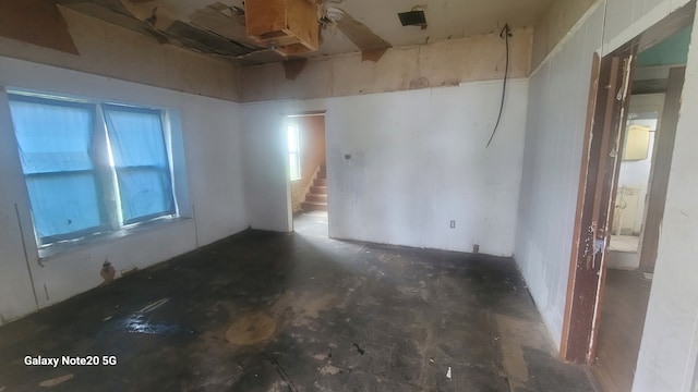 809 W Columbia St, Danville, IL 61832 - spare room with concrete flooring