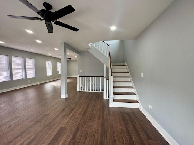 interior space with recessed lighting, ceiling fan, baseboards, and wood finished floors