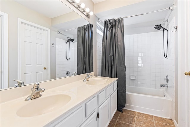 full bath featuring tile patterned flooring, double vanity, shower / tub combo, and a sink