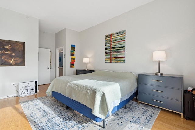 bedroom with light wood-style flooring