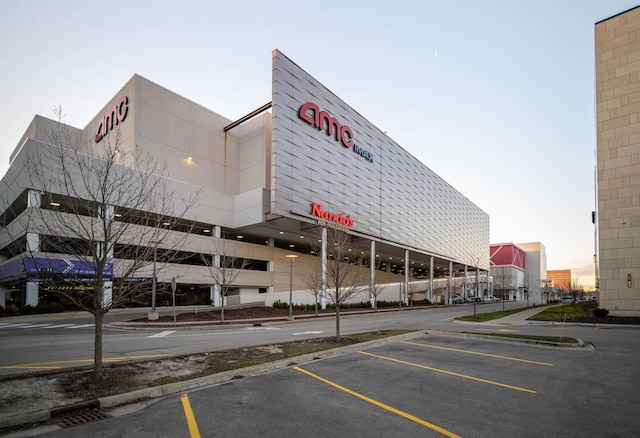 view of property featuring uncovered parking