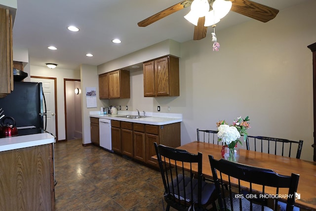 17825 W Cheyenne Ct, Grayslake, IL 60030 - kitchen featuring freestanding refrigerator, white dishwasher, a ceiling fan, a sink, and light countertops