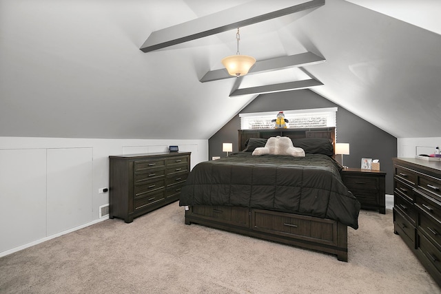 bedroom featuring light colored carpet and lofted ceiling with beams