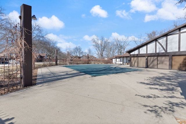 exterior space featuring a patio area and fence