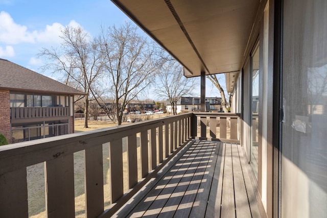 wooden deck with a residential view