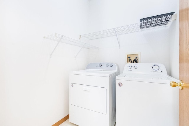 laundry room with laundry area and washer and dryer