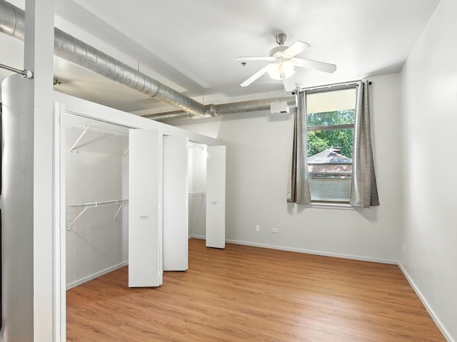 1000 E 53rd St Unit 112, Chicago, IL 60615 - unfurnished bedroom featuring light wood-style flooring and baseboards
