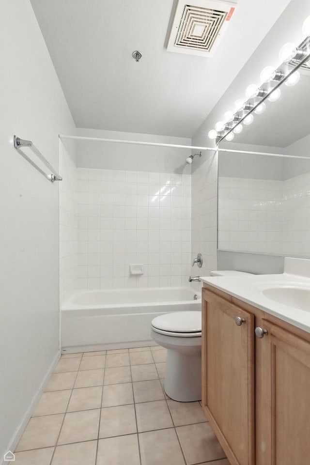 1000 E 53rd St Unit 112, Chicago, IL 60615 - bathroom with vanity,  shower combination, and tile patterned floors