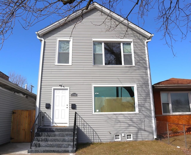 view of front of property with fence