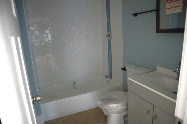 bathroom featuring tile patterned floors, shower / bath combination, toilet, and vanity