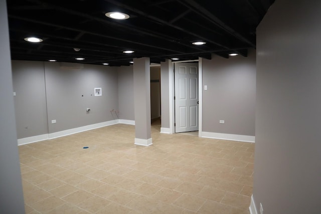 finished basement featuring recessed lighting and baseboards