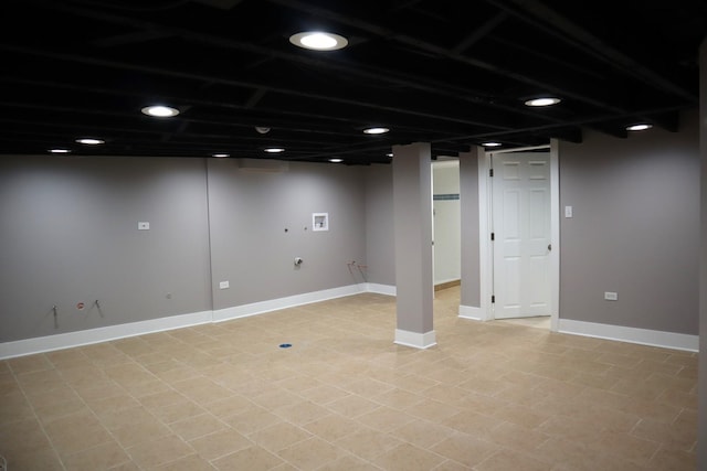 finished basement with recessed lighting and baseboards