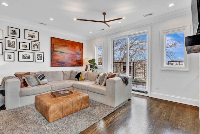 living room with visible vents, ornamental molding, dark wood-style flooring, and recessed lighting