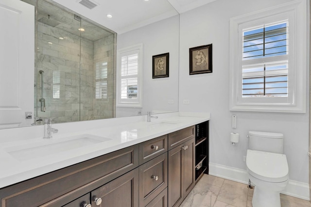 bathroom featuring a sink, visible vents, baseboards, toilet, and marble finish floor