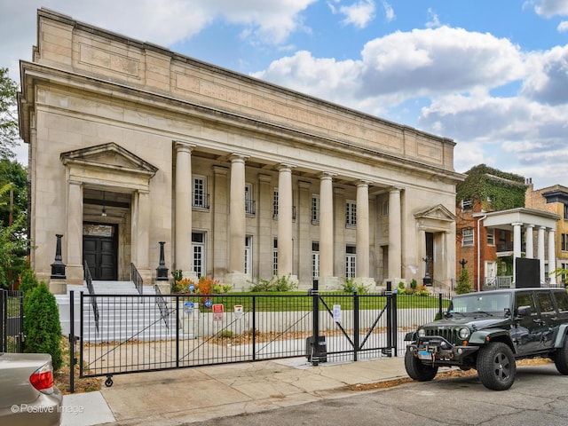 view of property with fence