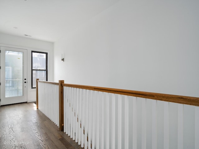 corridor with wood finished floors