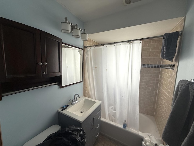 full bathroom featuring shower / bath combination with curtain and vanity