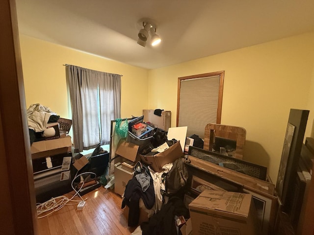 miscellaneous room featuring wood finished floors