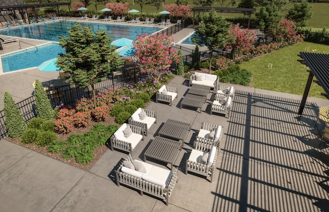 community pool featuring a patio area and fence