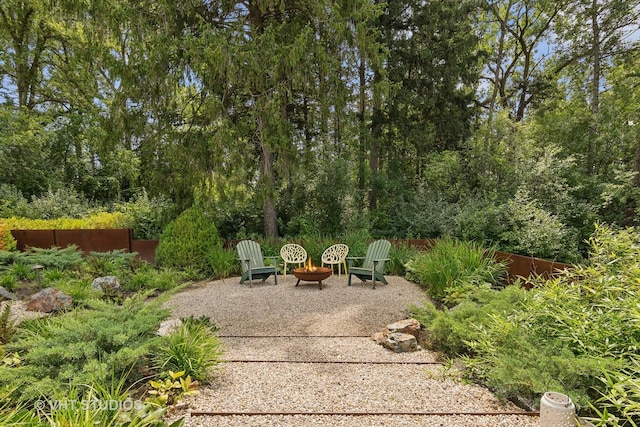 view of patio / terrace featuring fence