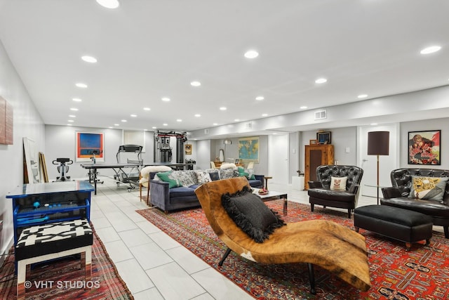living room with recessed lighting, visible vents, and light tile patterned floors