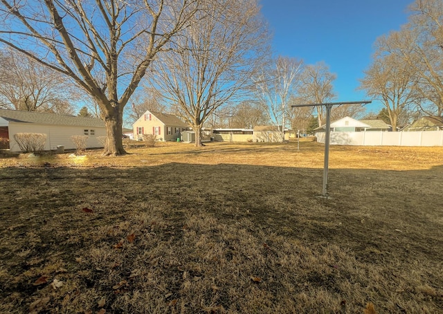 view of yard featuring fence