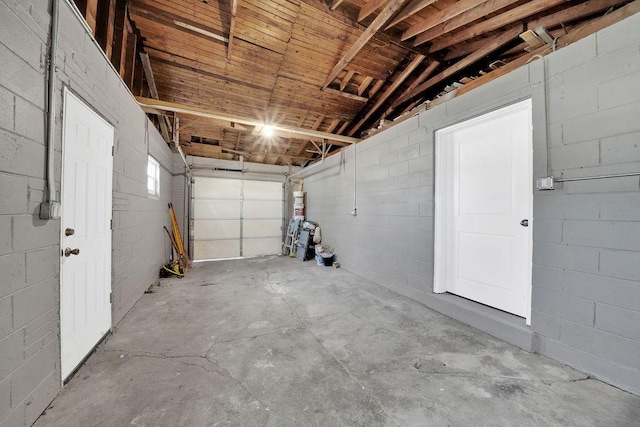 garage featuring concrete block wall