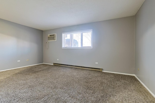 carpeted spare room featuring a textured ceiling, a wall mounted air conditioner, baseboards, and a baseboard radiator