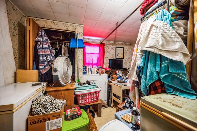 miscellaneous room featuring wallpapered walls and tile patterned floors