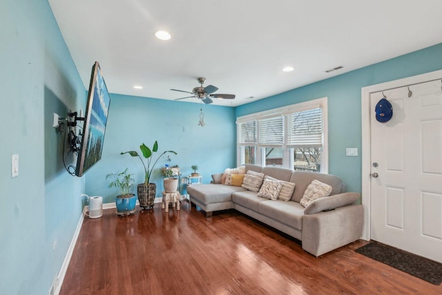 living area featuring visible vents, wood finished floors, recessed lighting, baseboards, and ceiling fan