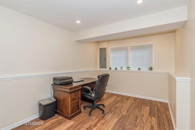 office area with recessed lighting, baseboards, and wood finished floors