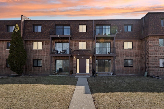 view of property at dusk