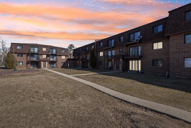 view of property at dusk