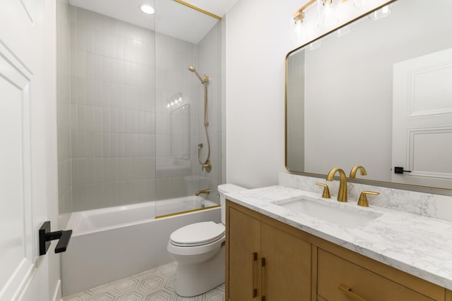 bathroom featuring vanity, toilet, and bathing tub / shower combination