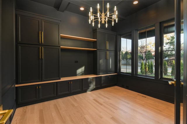 interior space with recessed lighting, a notable chandelier, wood finished floors, and visible vents