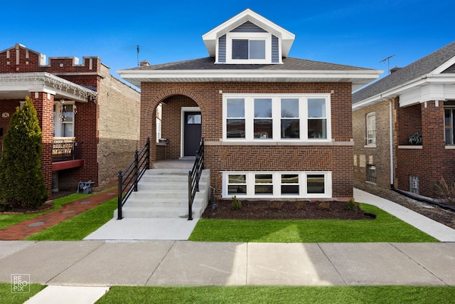 view of front of home with brick siding