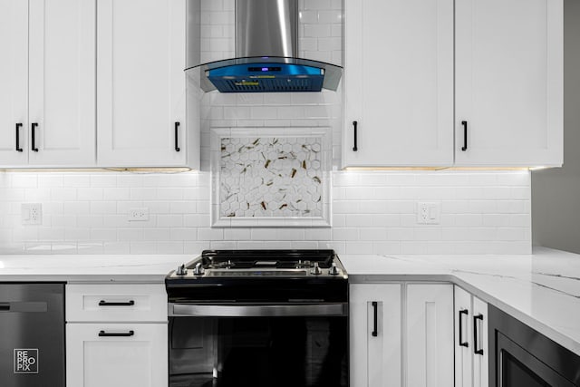 kitchen featuring backsplash, dishwasher, light stone counters, gas stove, and wall chimney exhaust hood