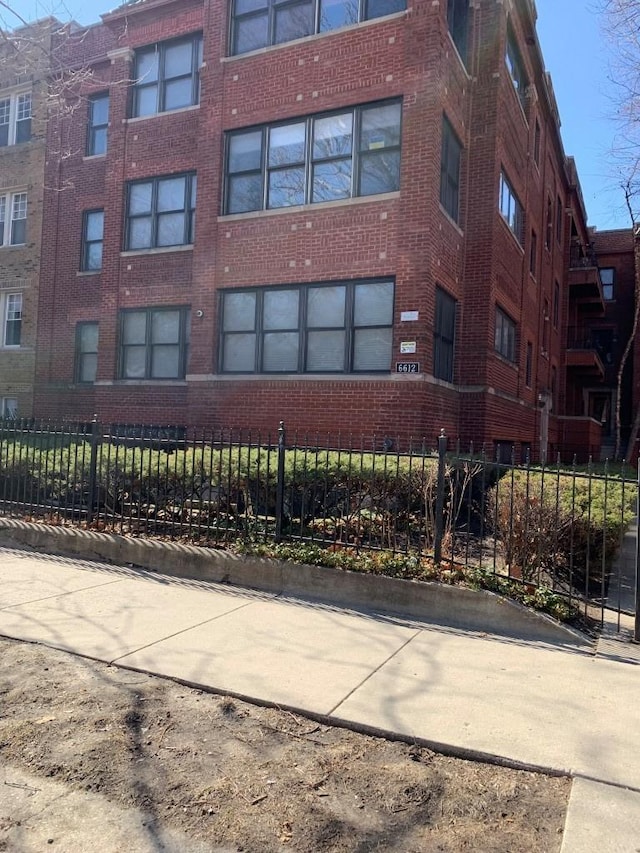 view of property featuring a fenced front yard