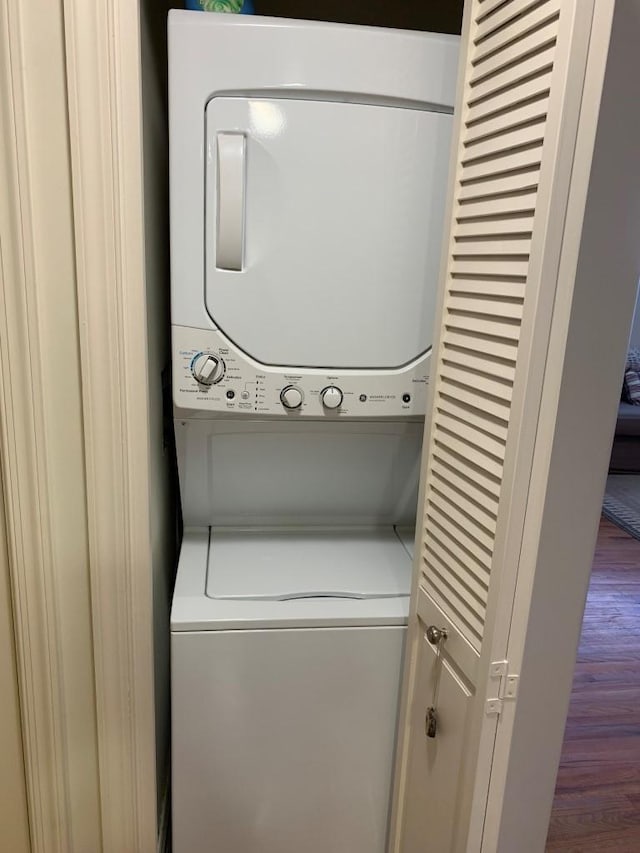 laundry area featuring laundry area and stacked washer / dryer