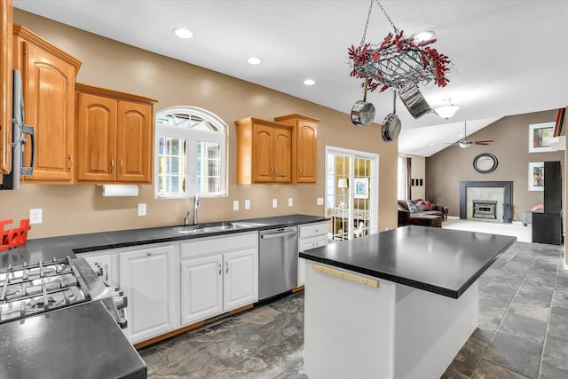 3402 Mill Creek Ct, Champaign, IL 61822 - kitchen featuring dark countertops, appliances with stainless steel finishes, a sink, and open floor plan